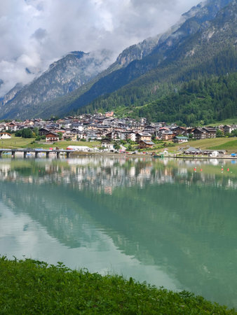 Landscape view of the alpine lake and village in the Swiss Alpsの写真素材