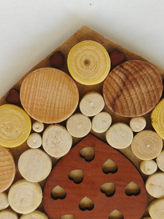 Wooden toys in a box on a white background close-upの写真素材