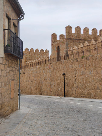 Town in Avila province in the center of Spain in a cloudy day
