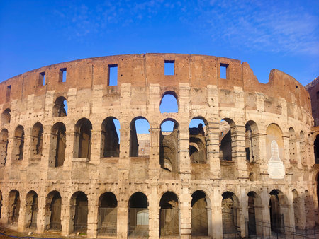 Colliseum in the center of Rome in a sunny day