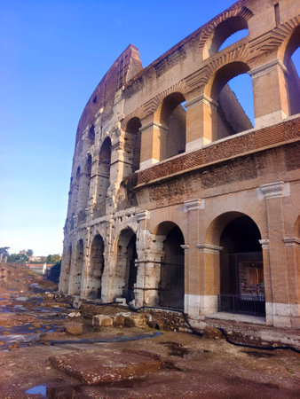 Colliseum in the center of Rome in a sunny dayの写真素材