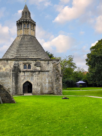 Ancient church in Glastonbury in a cloudy dayの写真素材