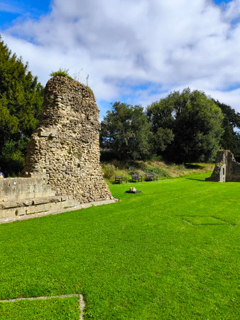 Ancient church ruins in Glastonbury on a cloudy dayの写真素材