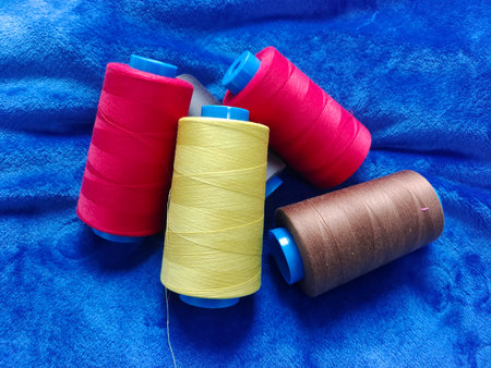 Coloured threads in blue background