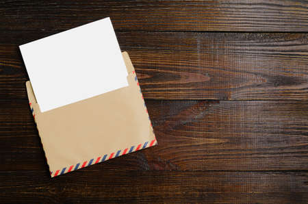 Envelope. Mockup letter on the wooden table.の写真素材
