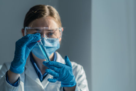 Medical research laboratory. A scientist works with a pipette and a test tube. Scientific laboratoryの写真素材