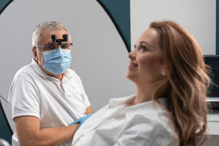 Against the background of treatment, the dentist may notice a smile of satisfaction on the patients...