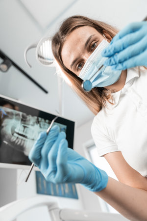 Modern equipment in the dental clinic provides the best result. An experienced dentist provides advice and guidance for better oral care.の写真素材