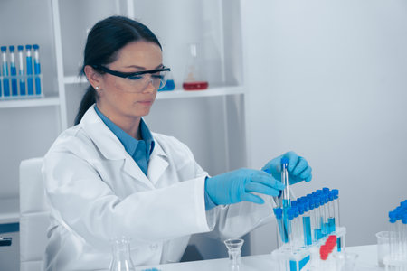 In a cuttingedge lab, a dedicated scientist conducts intricate research and collaborates with talented colleagues to explore groundbreaking advancements in various scientific fieldsの写真素材