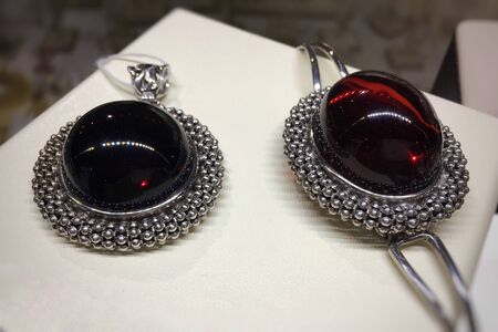 Luxurious silver jewelry with Mexican amber insert.. Template for jewelry store design.の写真素材
