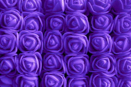 purple background of artificial roses close-up, Many blue rosesの写真素材
