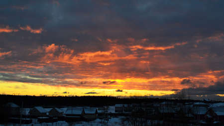 Bright multicolored sunset over the countrysideの写真素材