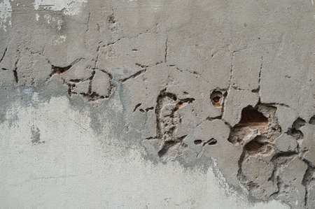 clacked cement of white wallの写真素材