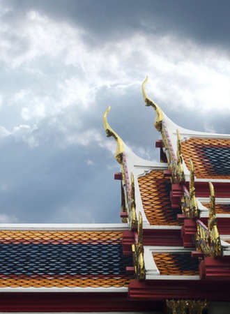 A roof temple in Thailandの写真素材
