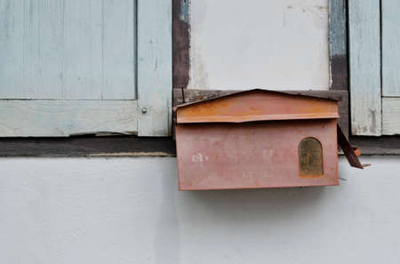 old mail box on the dirty wallの写真素材