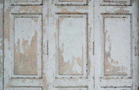 Paint peeling old wooden doorの写真素材