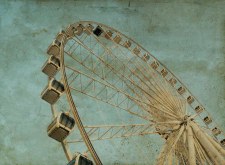 Grunge Ferris Wheel, vintage paper textureの写真素材