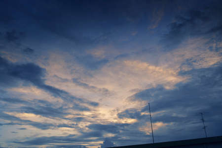 background of the sky with clouds at sunsetの写真素材