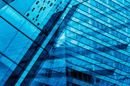 Glass of modern tower for business background, blue toneの写真素材