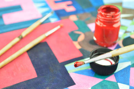 paintbrush with bottle color on old paint imageの写真素材