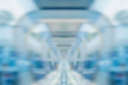 Blurred motion of footpath in modern business tower, Blue toneの写真素材