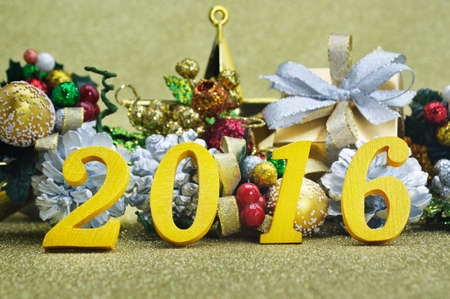2016 new year decoration with christmas ornament on gold background, 2016 new year cocept