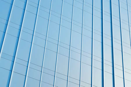 Modern blue metal wall of office buildingの写真素材