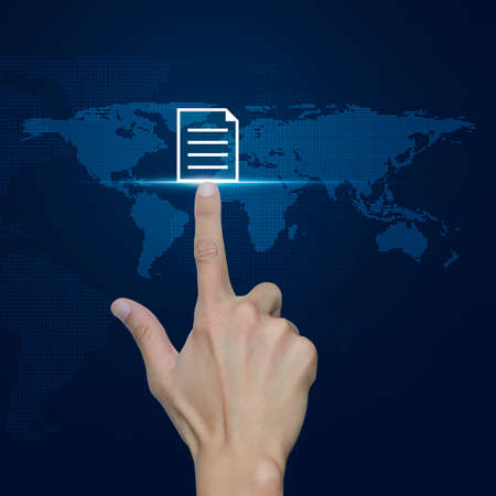 Hand pressing document icon over digital world map blue background, Elements of this image furnished by NASAの写真素材