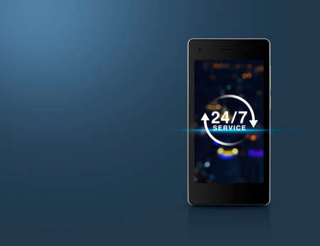 24 hours service icon on blur light city tower screen in modern smart phone over blue background,...