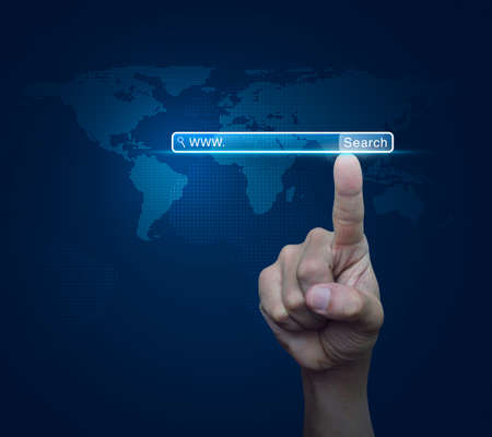 Hand pressing search www button over digital world map blue background, Searching system and internet concept, Elements of this image furnished by NASAの写真素材