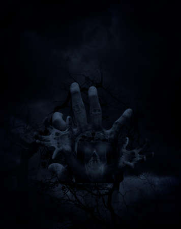 Double exposure of hand blend with ancient window and stone texture with human skull over moon, dead tree and cloudy sky, Halloween abstract conceptの写真素材