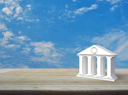Bank 3d icon on wooden table over blue sky with white clouds, Business banking online conceptの写真素材