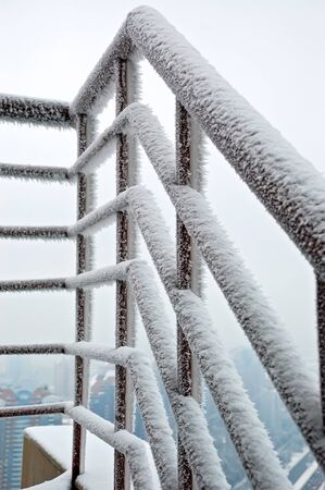 railing in snowの写真素材