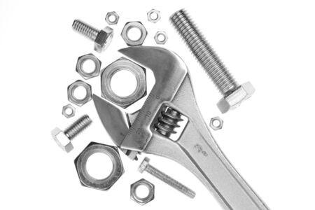 Adjustable work wrench with nuts and screwsの写真素材
