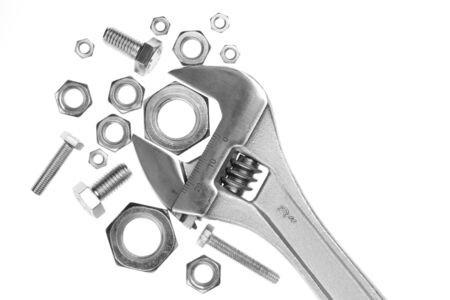 Adjustable work wrench with nuts and screwsの写真素材