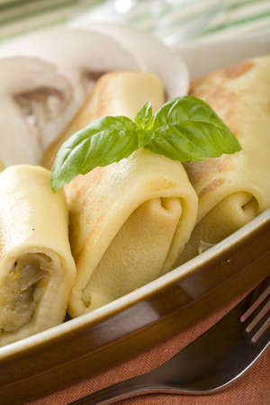 Four croquettes in brown dishの写真素材