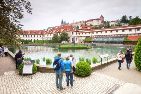 Prague, Czech Republic - May 08, 2013: Prague, capital of Czech Republic. Wallenstein Gardens (Valdstejnska zahrada). Tourists walking around the pond with a fountain.のeditorial素材