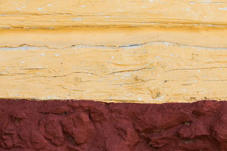 the structure of the plaster in yellow and dark redの写真素材