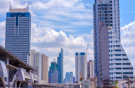 Buildings in city near near way of skytrain ,Cloud blue sky