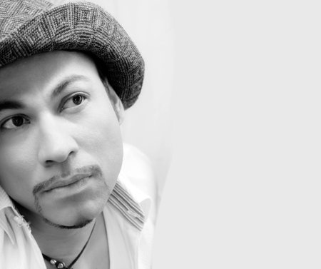 Black -White Man Portrait white shirt put hat glance looking
