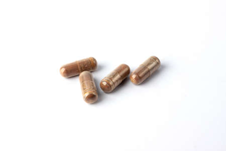 Grape Extract powder capsule on white background