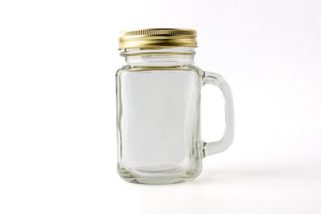 Transparent empty smoothy juice container or juice glass on white backgroundの写真素材