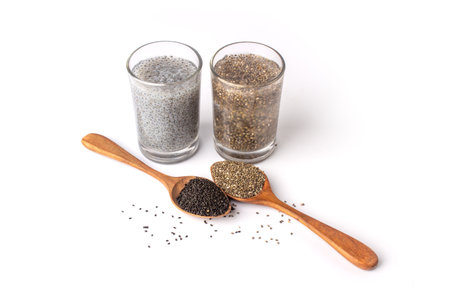 Basil seeds and chia seeds water drink with wooden spoonの写真素材