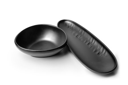 Black ceramic bowl isolated on white background. Clipping path included.の写真素材