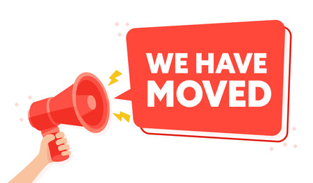 Announcement of Location Change with Hand Held Megaphone We Have Moved Vector Illustrationのイラスト素材
