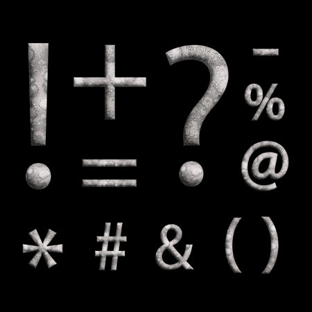 A set of alphabets and symbols on a black backgroundの写真素材