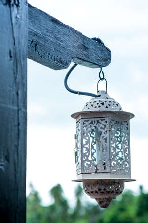 An old lamp post in the gardenの写真素材