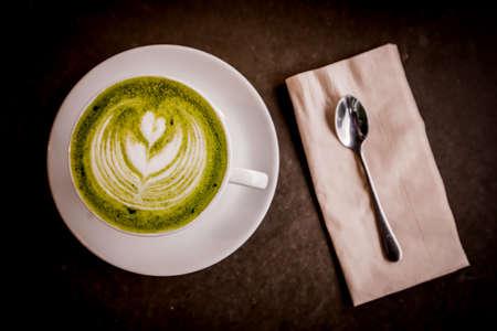 Hot green tea at the cafeの写真素材