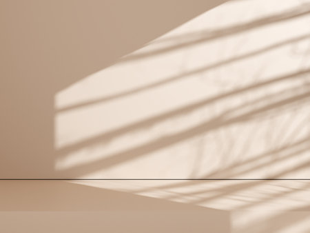 Natural shadow on a beige wall background for product presentation. Silhouette on beige background. Luxury summer architecture interior aesthetic. Modern tropical mockup design. 3d rendering.の写真素材