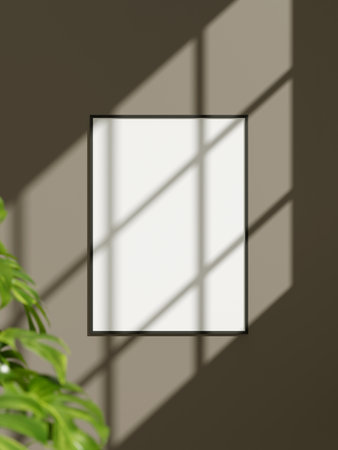 Photo frame mockup hanging on the wallの写真素材